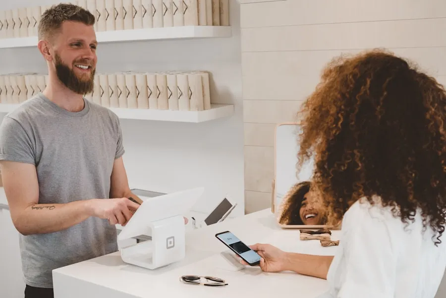 A customer paying in a shop through an app